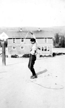 Board of Trade - Williams Lake - [Young man demonstrating a lasso]