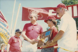 Award presentation at finish line