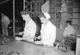 [Workers assembling airplane parts at the Boeing plant on Sea Island]