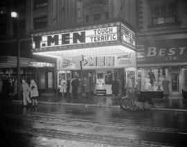 [Exterior view of the Orpheum Theatre showing the posters and displays for the "T-Men" ...