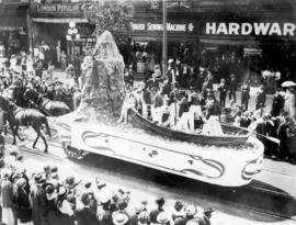 [Unidentified float in the 600 Block of Granville Street during a Victoria Day parade]
