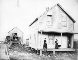 [Exterior of T.J. Janes residence and Livery and Feed Stable - Westminster Avenue (Main Street) L...