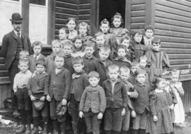 [A class outside East South Vancouver (Carlton) School on Joyce Road (Street) and Westminster Roa...