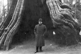 [An unidentified man in front of the Hollow Tree]