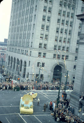 43rd Grey Cup Parade, on Granville Street and Hastings, Shell float turning, spectators and Royal...