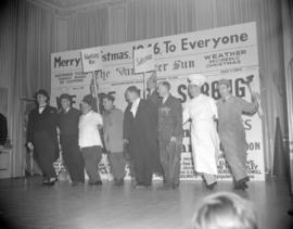 [Board of Trade members doing a skit at a Christmas party]