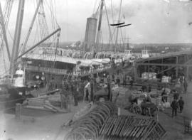 [Ships, workers, and cargo at C.P.R. dock, Vancouver]