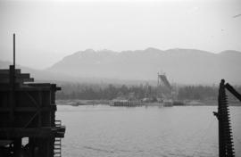[View of the Lions Gate Bridge under construction on the north shore]