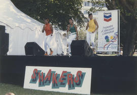Singers performing on Chevron Stage