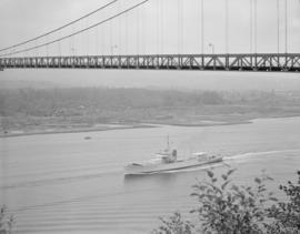 Boats under Lions Gate Bridge