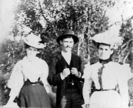 [Unidentified man with two women]