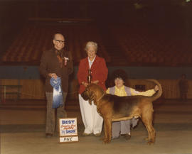 Best Canadian Bred Puppy in Show award being presented at 1976 P.N.E. All-Breed Dog Show [Bloodho...