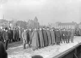 [Senior officers and crowd at Cambie Grounds]