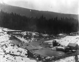 Coquitlam Dam [showing] view downstream from east bank over spillway