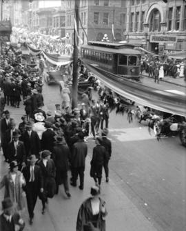 [Crowds gathered at Granville and Pender Streets for celebration]