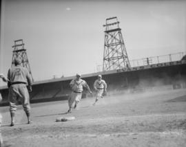 Maple Leaf Baseball Players [Two players running bases]