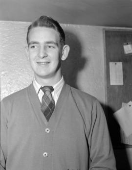 [Head and shoulders portrait of a Vancouver News-Herald sports department staff member]