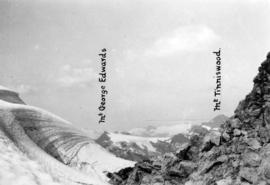 [Distant view of the peaks of Mount George Edwards and Mount Tinniswood]