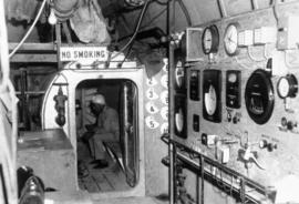 Highbury tunnel showing worker and gauges