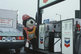Tillicum pumping gas at Tremblay and Sons Chevron Station on 4th Avenue and Macdonald Street