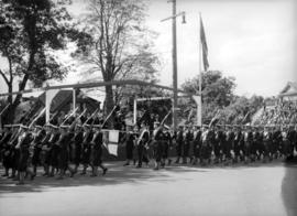 [King George VI and Queen Elizabeth reviewing naval parade on Douglas Street]