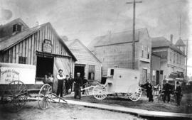 [The first ambulance built by Thomas Lobb in front of his blacksmith business on Westminster Road...