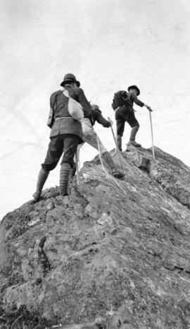 [Franklin W. Hewton and others climb "The Ridge" on Mount Garibaldi]