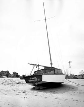 [Yacht "Jeanine" on Kitsilano Beach after a storm]