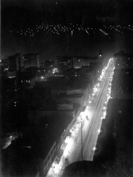 [View of Granville Street at night]
