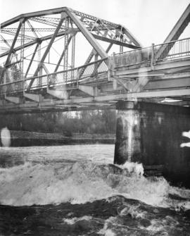 [Water surging under Capilano Creek Bridge]
