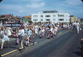 Parade, on Cornwall Street, Haddon Play Group children on tricycles and spectators