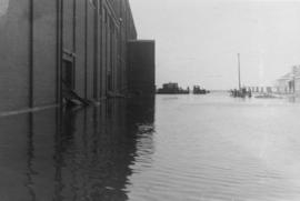 Flood waters next to Manitoba Sugar Company factory building - 2