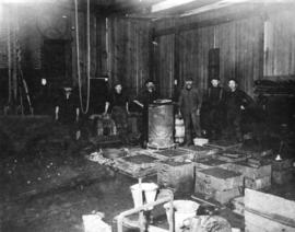 [Workers in an iron foundry]
