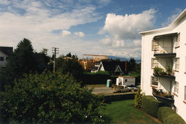 View of house under construction from Killarney Manor at 2890 Point Grey Road