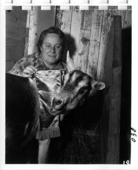 Woman with award-winning goat in 1956 P.N.E. Livestock competition