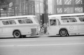 Two buses outside the Eaton's Building