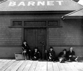 [James Crookall and other photographers at the Barnet Station]