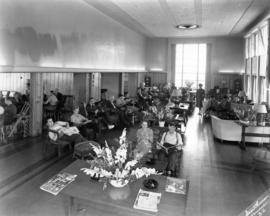 Interior view of waiting room with patients at Shaughnessy Hospital