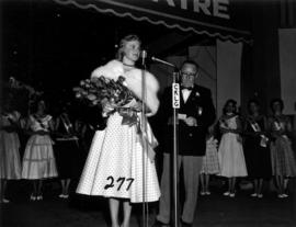 Glenda Sjoberg, winner of Miss P.N.E. 1955, speaking on Outdoor Theatre stage