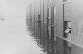 Flood waters next to Manitoba Sugar Company factory building - 1