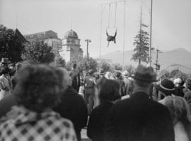 Canada Pacific Exhibition [A crowd watching a trapeze performer]