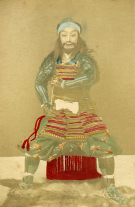 [Full-length studio portrait of a man in formal Japanese dress]