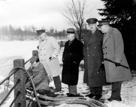[Major J.P. Mackenzie and others inspecting fire equipment]
