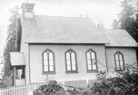 [Exterior of the first St. James Church near the foot of Main Street]