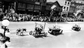 [Decorated automobiles in the Dominion Day Parade]