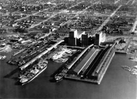 Aerial view looking south towards Vancouver Terminal Company grain elevators and docks