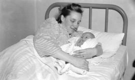 [Mrs. Robert Camp, with her newborn son, Michael Robert, at North Vancouver General Hospital on N...