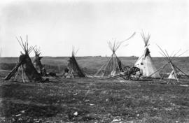 [Tepees and a Red River cart near Fort Carleton, N.W.T.]