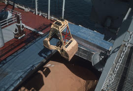 Earth moving equipment, on ship [?]