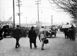 [People heading towards wartime carnival on the Cambie Street Grounds]